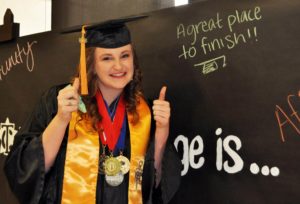 McKenzie Madill poses backstage at Texarkana College’s Spring 2016 commencement ceremony.
