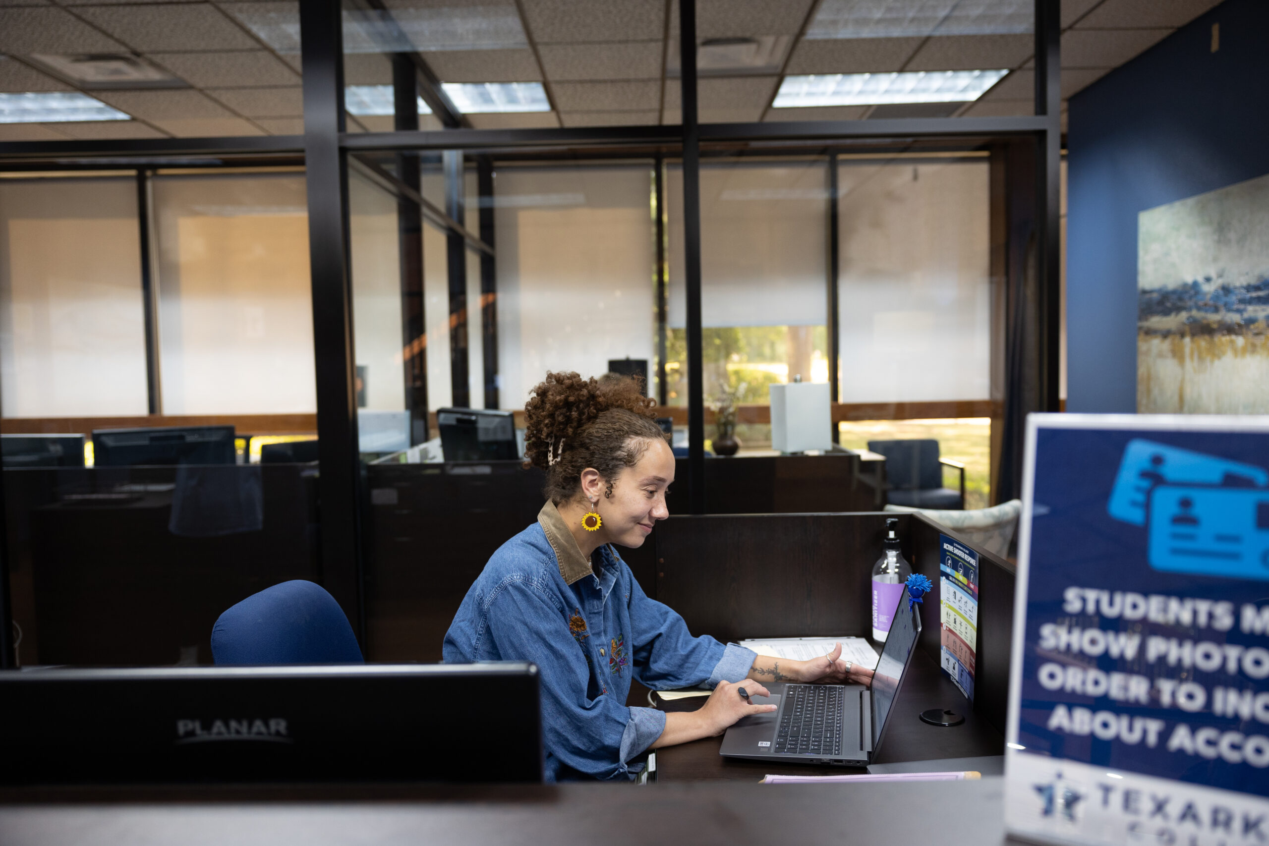 A student learning about community college scholarship opportunities.