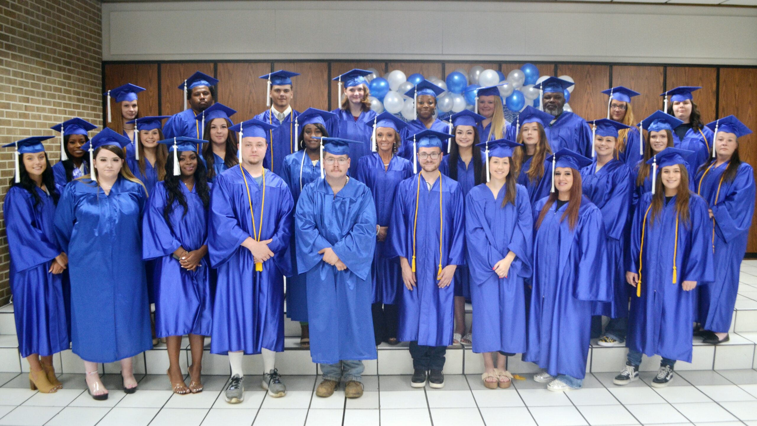 Graduates at an event inside the student center